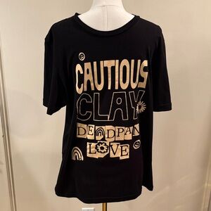 Cautious Clay Black Tshirt